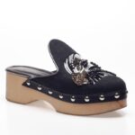 Black embroidered clogs