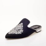 Embroidered black mules